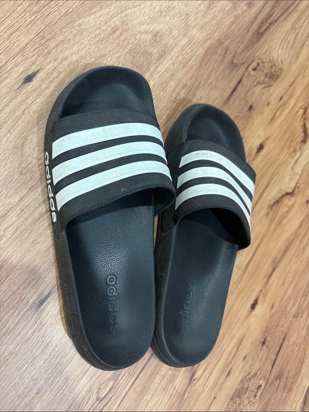 Men’s size 11 adidas Black Slides with White Three-Stripes